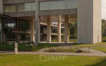 Exterior view of a modern office building at Nachtwachtlaan 20, Amsterdam West, suitable for office space rental.