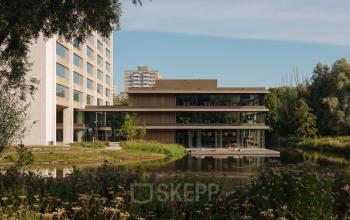 Exterior view of a modern office building at Nachtwachtlaan 20 in Amsterdam West, ideal for office space rental.