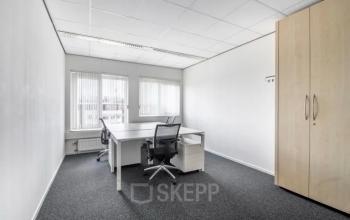 Bright office space at Hullenbergweg 278 in Amsterdam South East, featuring modern furniture and natural light ideal for office space rental.