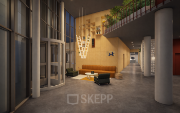 Spacious office entrance at Luttenbergweg 8, Amsterdam South East, featuring modern seating and tall windows, ideal for office space rental.