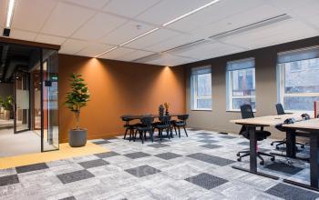 Contemporary office space at Hullenbergweg 109-135 in Amsterdam South East with large windows and modern furnishings, ideal for office space rental.