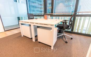 Bright office to rent at Herikerbergweg 292, Amsterdam South East featuring modern furnishings, a desk, and ergonomic chair perfect for office space rental.