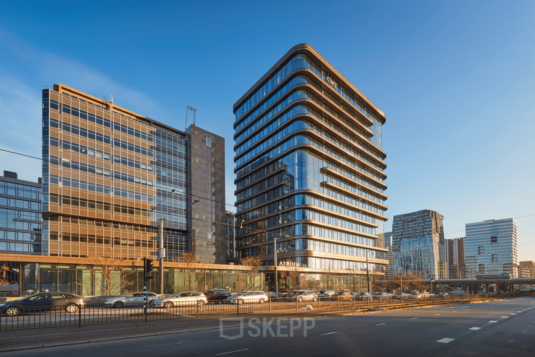 Exterior view of modern office buildings at Strawinskylaan 3051, Amsterdam Zuidas, perfect for office space rental.