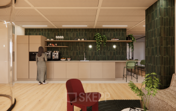 Modern office space rental in Amsterdam Zuidas at Beethovenstraat 503. Features a stylish lounge area with a kitchenette, comfortable seating, and contemporary decor. Ideal for informal meetings and breaks.