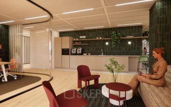 Modern workspace in Amsterdam Zuidas featuring sleek furnishings, a kitchenette, and dedicated seating areas. Ideal for office space rental.