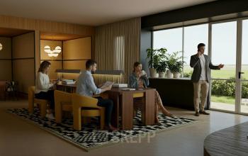 Rent office space at Barbara Strozzilaan 101 101, Amsterdam Zuidas. People engaged in various business activities in a furnished, well-lit workspace with large windows.