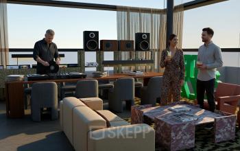 Stylish office space for rent at Barbara Strozzilaan 101 101, Amsterdam Zuidas. Features a modern lounge with DJ playing music, and two people conversing, enhancing this office space rental.