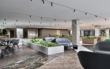 Elegant office space rental at Claude Debussylaan 80-134 in Amsterdam Zuidas, featuring modern furnishings and a spacious, open floorplan with natural light.