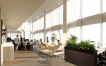 Modern office space at Claude Debussylaan 80-134, Amsterdam Zuidas, featuring natural light, stylish furniture, and professionals collaborating. Ideal for office space rental.