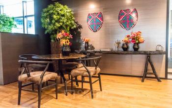 Inviting furnished office space with vibrant decor at Claude Debussylaan 7-29, Amsterdam Zuidas, perfect for office space rental.