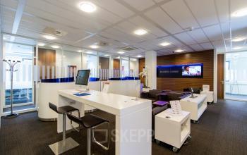 Modern office space rental at Het Rietveld 55A, Apeldoorn, featuring a well-equipped reception area with comfortable seating and a welcoming ambiance.