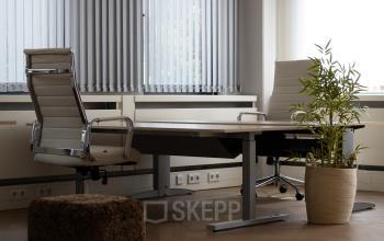 Furnished office space at Schumanpark 9, Apeldoorn, featuring modern chairs and a desk, ideal for office space rental.