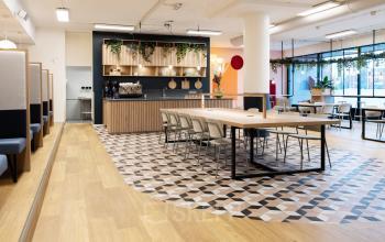 Modern office space rental at Jansbuitensingel 30, Arnhem Centrum with stylish furnishings and a welcoming open floorplan.