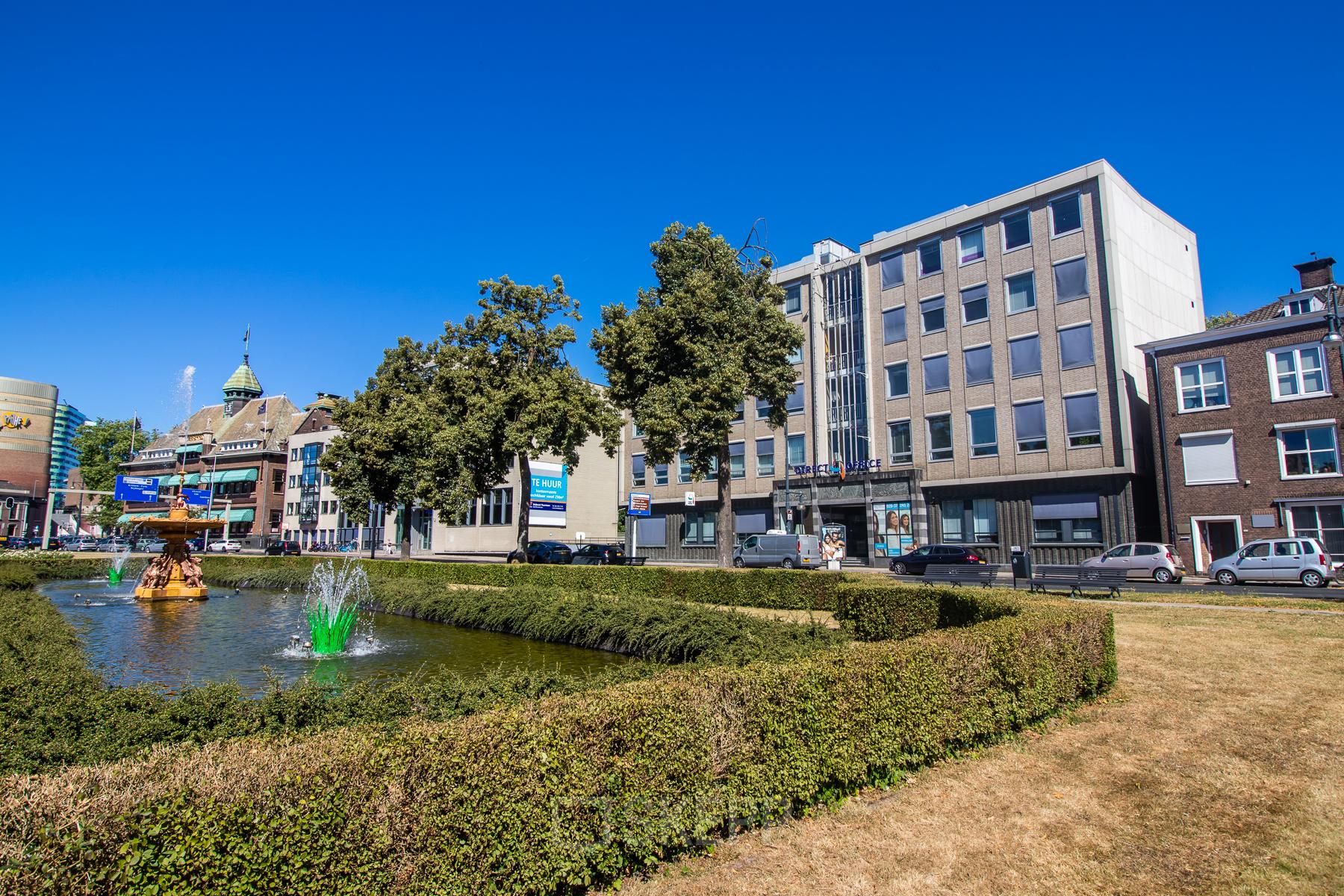 Exterior view of a commercial building at Jansbuitensingel 7, a prime location for office to rent in Arnhem Centrum.