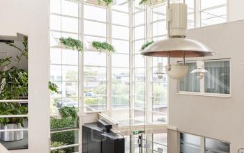 Bright office space with large windows and ample natural light at Vlamoven 34, Arnhem IJsseloord, ideal for office space rental.