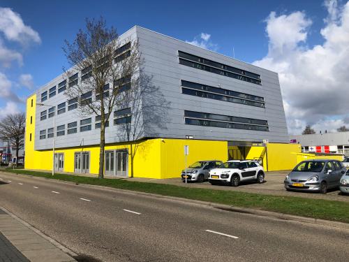 Modern, vibrant office space rental at Simon Stevinweg 27, showcasing the dynamic exterior in Arnhem Oost.