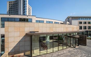 Exterior view of the office building at Rijksweg-West 2 in Arnhem Zuid, Arnhem, showcasing modern architecture with large glass windows.