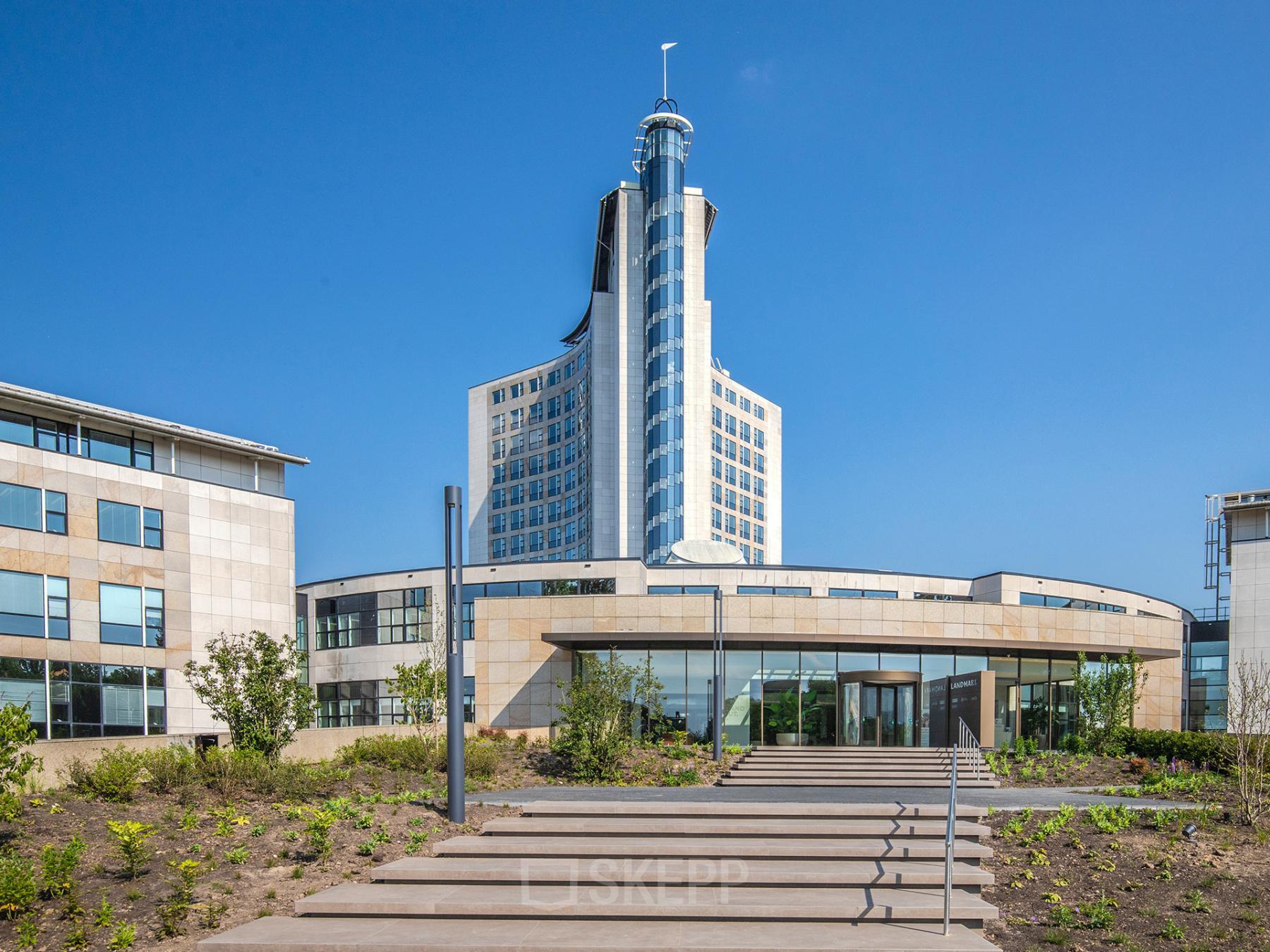 Exterior of the modern office building located at Rijksweg-West 2, Arnhem Zuid, Arnhem, featuring sleek architecture and landscaped surroundings, ideal for office space rental.