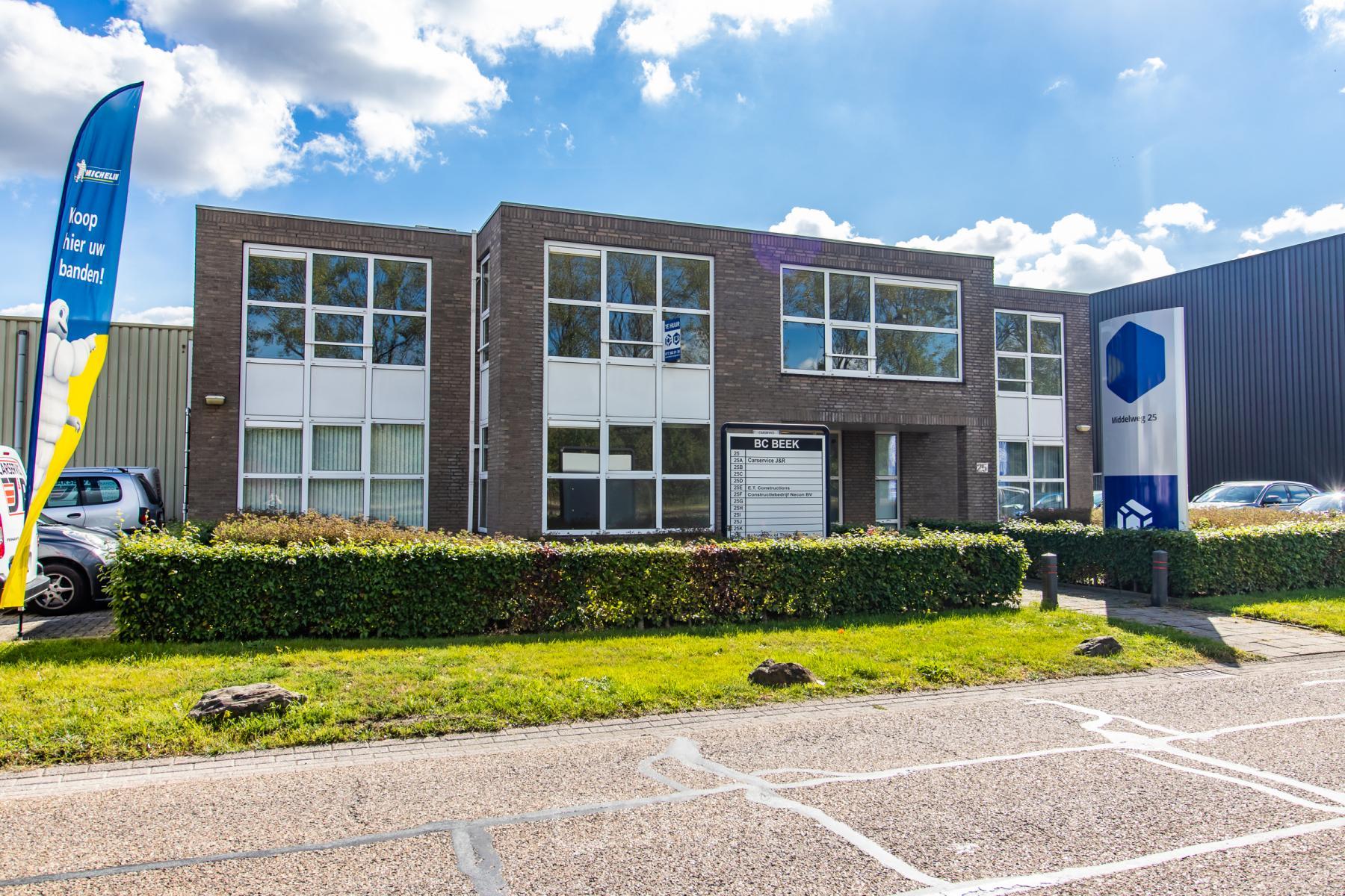 Exterior view of the office building located at Middelweg 25, Beek Lb, available for office space rental.