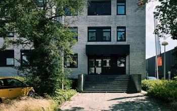 Exterior view of office building at Druivenstraat 25-31, Breda Oost, suitable for office space rental.