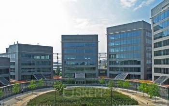 Office buildings at Leonardo Da Vincilaan 19, Brussels Airport, Brussels, featuring modern architecture and surrounding green areas.