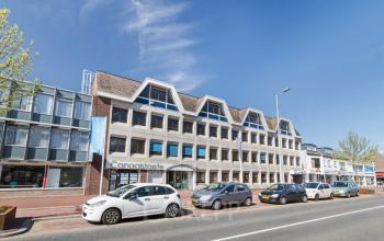 Modern Kanaalweg 33 office space rental in Capelle aan den IJssel with a clear blue sky backdrop.