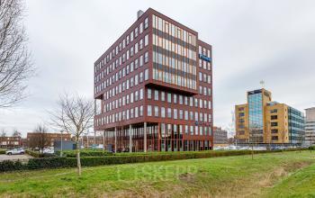 Exterior view of an office building at Fascinatio Boulevard 562, Capelle aan den IJssel, ideal for office space rental.