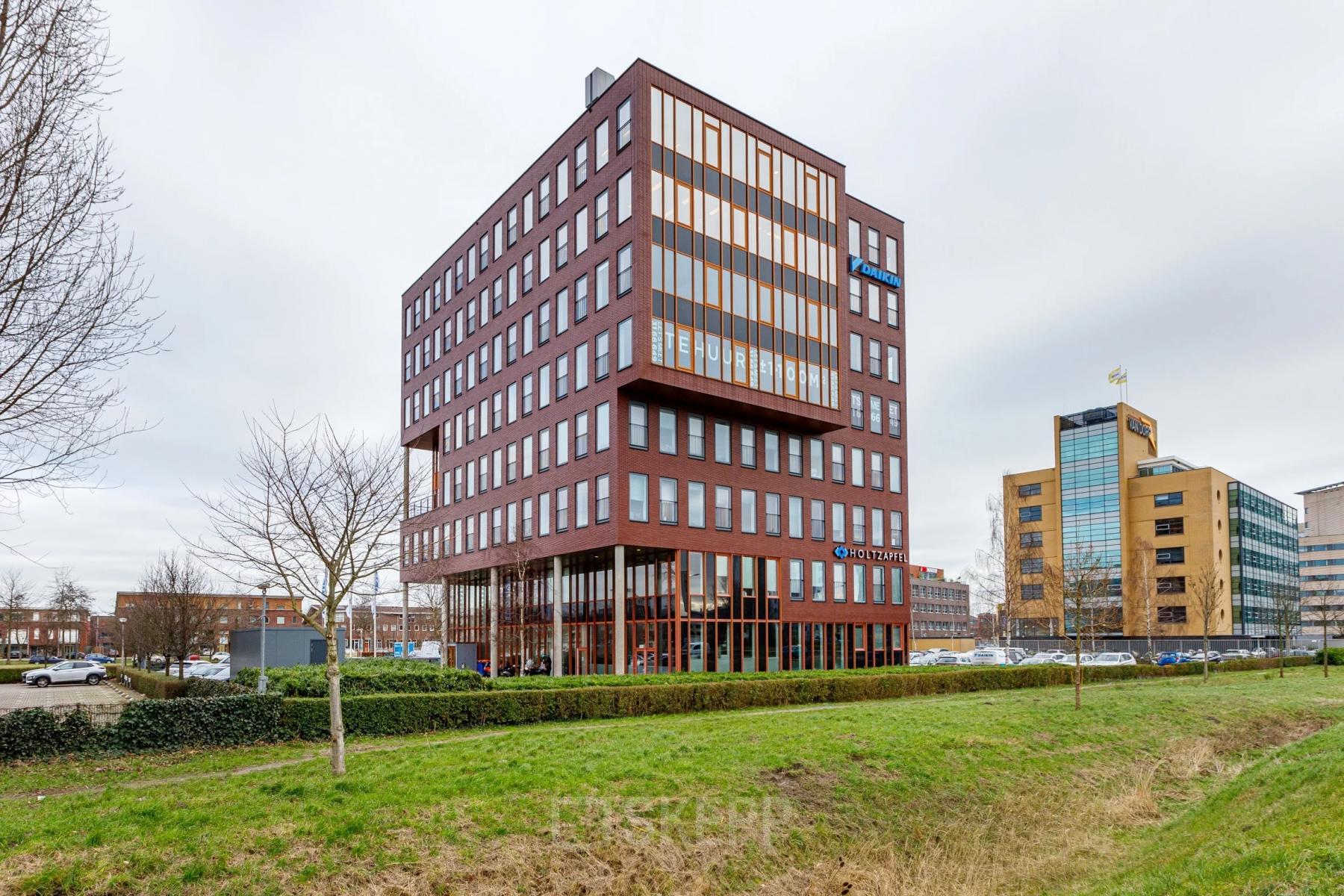 Exterior view of an office building at Fascinatio Boulevard 562, Capelle aan den IJssel, ideal for office space rental.