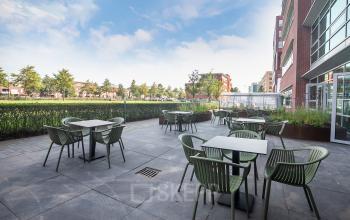 Outdoor terrace with modern seating at Fascinatio Boulevard 522, Capelle aan den IJssel, ideal for casual meetings or breaks.