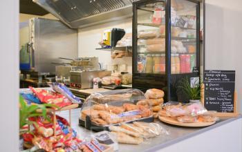 Interior view of a pantry at Rivium Quadrant 75 in Capelle aan den IJssel, featuring a variety of snacks and beverages on display. Ideal for tenants utilizing office space rental options.
