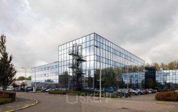 Exterior view of a modern office building at Essebaan 63, Capelle aan den IJssel, available for office space rental.