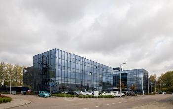 Modern office building at Essebaan 63, Capelle aan den IJssel, ideal for office space rental with ample parking.
