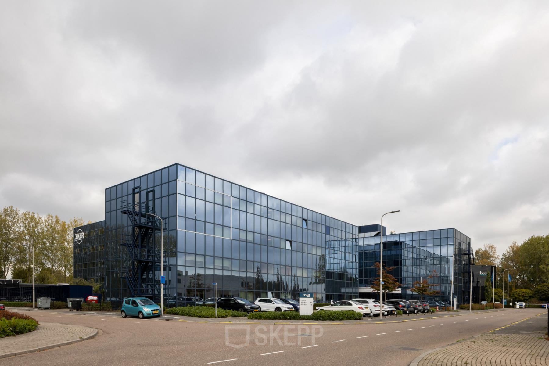 Modern office building at Essebaan 63, Capelle aan den IJssel, ideal for office space rental with ample parking.