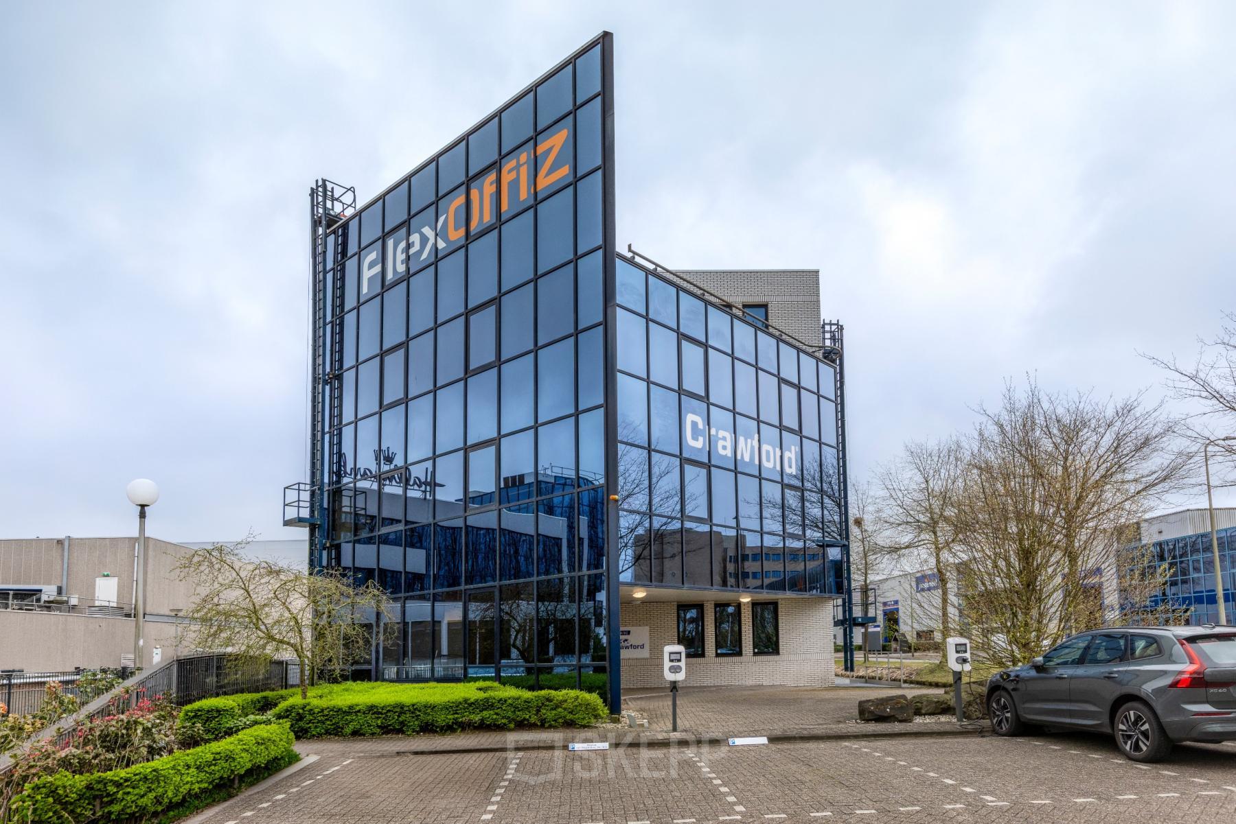 Exterior view of an office building at Vlierbaan 20, Capelle aan den IJssel, ideal for office space rental.