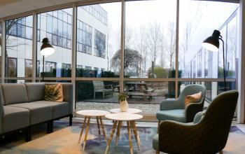Chairs and couch in office building Capelle