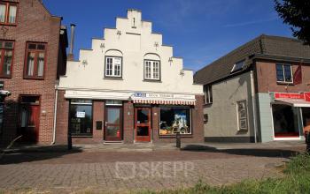 Office space rental at Strijkviertel 63, De Meern with a characterful white façade and red window accents.