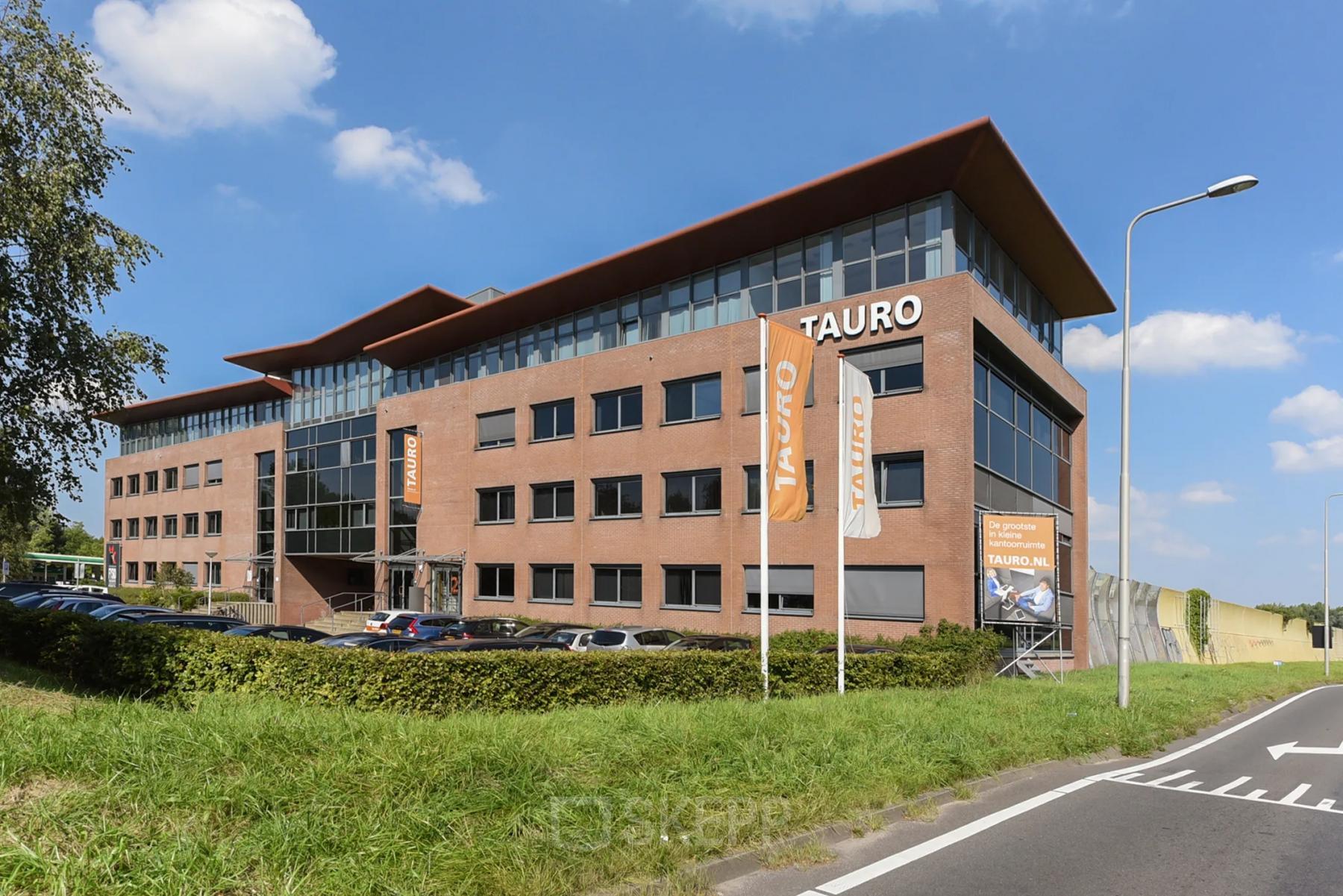Exterior view of office building at Marshalllaan 2, Delft, showcasing rental office space availability.