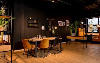 Modern furnished office space with plants and warm lighting at Bruistensingel 400, perfect for rent office space in Den Bosch.