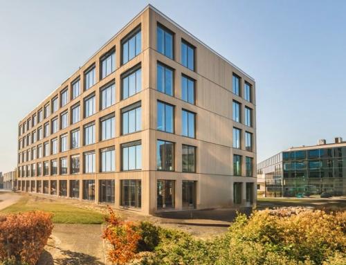 Modern office building at Hambakenwetering 1-kr, Den Bosch, featuring large windows and contemporary architecture. Ideal for office space rental with ample natural light.