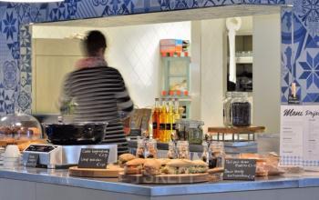 Lunchroom in office building blue wall