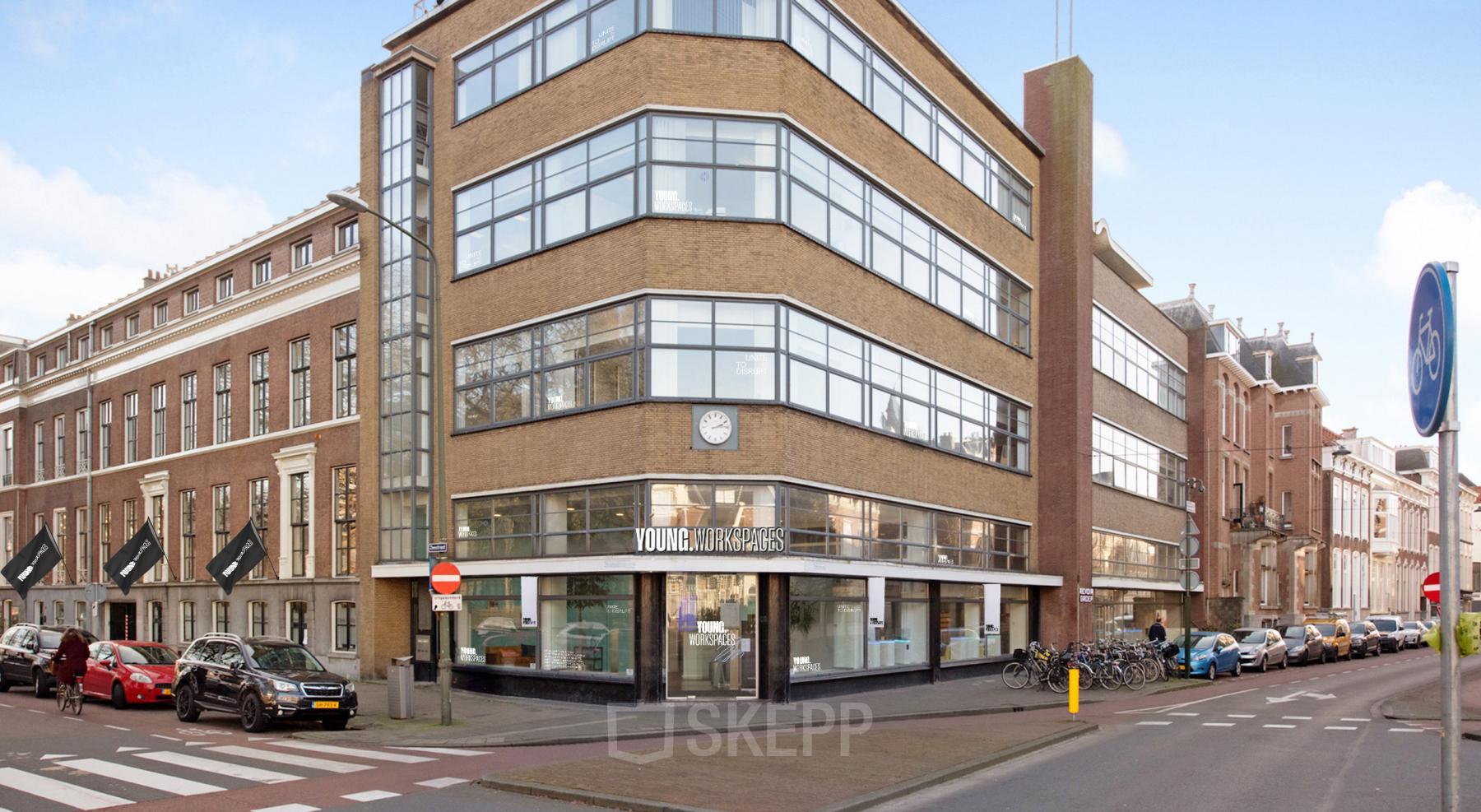 Exterior view of an office building for rent at Zeestraat 100, The Hague Center, showing a modern facade with large windows.