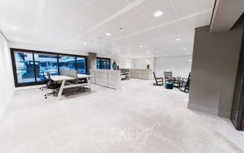 Bright office space at Anna van Buerenplein 41 with modern furnishings, offering an option for office space rental in The Hague Center.