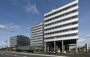 Modern office space rental at Oude Middenweg 3-19, The Hague with a contemporary design and expansive windows.