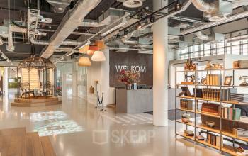 Elegant and inviting reception area of an office space rental at Oude Middenweg 3-19, The Hague, with stylish decor and a welcoming vibe.