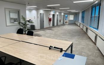 Spacious office interior at Oder 20, The Hague Leidschenveen-ypenburg, featuring open workstations and natural light. Ideal for office space rental needs, offering a blend of functionality and comfort.