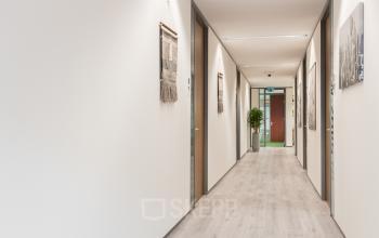 Hallway at Zutphenseweg 29, Deventer, ideal for office space rental with modern and clean design.