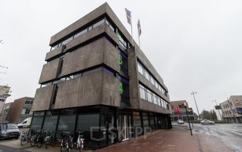Exterior view of the office building at Berglaan 4-8, Drachten, available for office space rental.