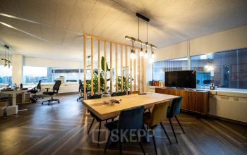 Modern office space rental at Bogert 1, Eindhoven Center, featuring stylish furnishings, ample lighting, and a welcoming vibe.
