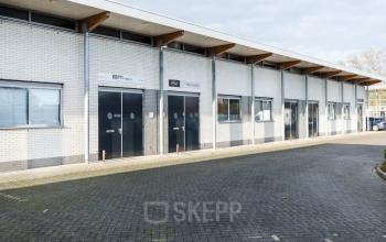 Exterior view of the offices at Kanaaldijk-Zuid 19 in Eindhoven Center, showcasing modern industrial design.