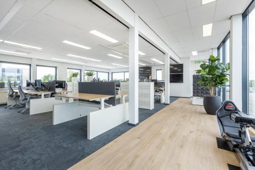 Bright and open office space with desks and chairs, ready for office space rental at Meerenakkerplein in Eindhoven.